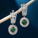 Rhodium Plated Oval Green AD Studded Contemporary Long Drop Earrings