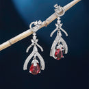 Rhodium-Plated Red American Diamond studded Teardrop & Quirky Shaped Drop Earrings