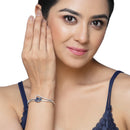 Rhodium Plated Silver Toned Flower Shaped Royal Blue American Diamond Studded  Bracelet