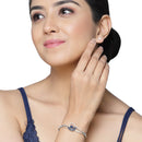 Rhodium Plated Silver Toned Flower Shaped Royal Blue American Diamond Studded  Bracelet