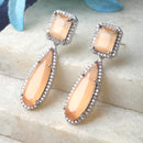 Rhodium-Plated Orange & White American Diamond studded Teardrop Shaped Drop Earrings