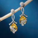Rhodium-Plated Yellow & White American Diamond studded Trardrop Shaped Drop Earrings