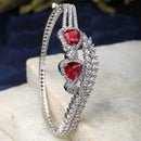 Rhodium-Plated Silver Toned Teardrop & Leaf Shaped Red American Diamond Studded  Kada Bracelet