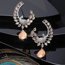 Rhodium-Plated Orange American Diamond studded Peacock & Feather Shaped Drop Earrings