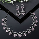 Rhodium-Plated Pink Oval American Diamond Studded Circular Shaped Necklace & Earrings Jewellery Set