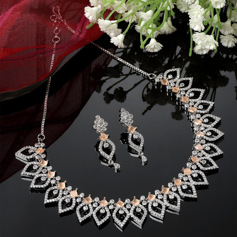 Rhodium-Plated Orange American Diamond Studded Floral & Leaf Shaped Necklace with Earrings Jewellery Set