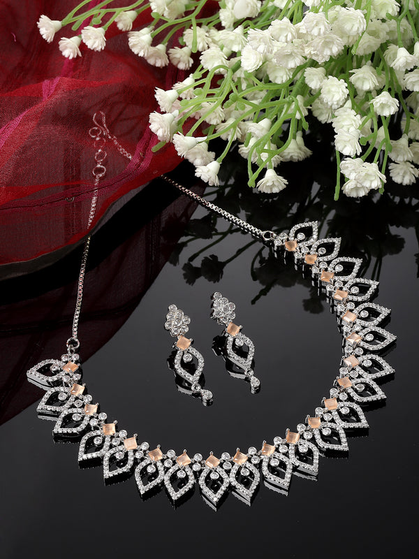 Rhodium-Plated Orange American Diamond Studded Floral & Leaf Shaped Necklace with Earrings Jewellery Set