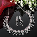 Rhodium-Plated Pink American Diamond Studded Floral & Leaf Shaped Necklace with Earrings Jewellery Set