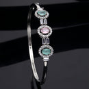 Rhodium-Plated Silver Toned Oval Shaped Sea Green & Pink American Diamond Studded Kada Bracelet