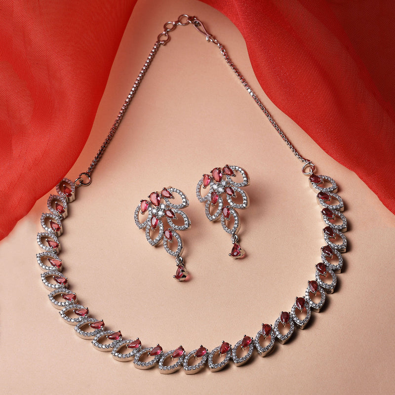 Rhodium-Plated Red American Diamond Studded Leaf Shaped Necklace with Earrings Jewellery Set