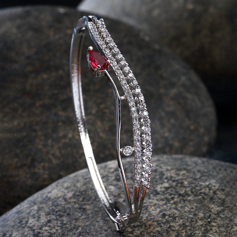 Rhodium Plated Silver Toned Ruby Red Teardrop Shaped American Diamond Stone Studded Kada Bracelet