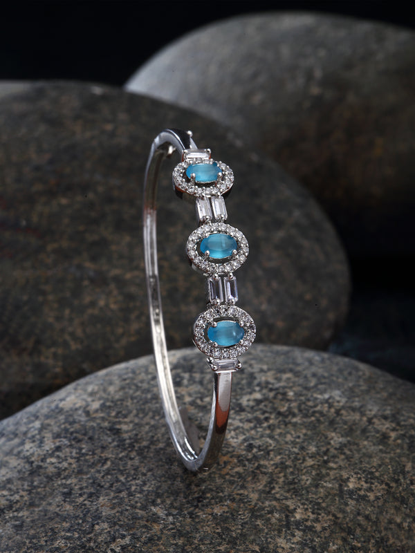 Rhodium-Plated Sky Blue Oval Shape American Diamond Studded Kada Bracelet