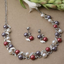 Silver-Plated Red & White Artificial Stones Studded Leafy Shaped Necklace with Earrings Jewellery Set