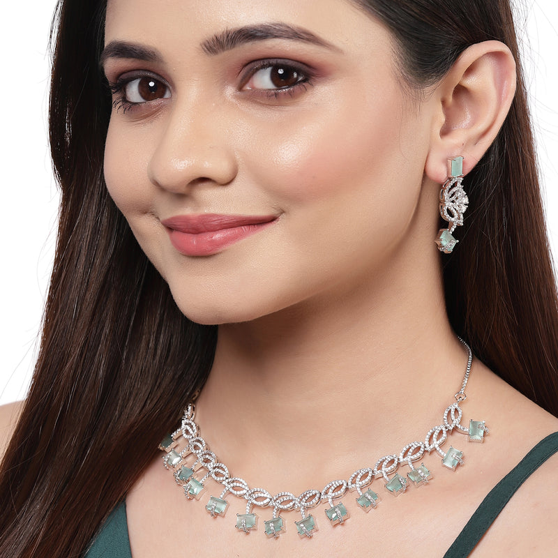 Rhodium-Plated with Silver-Toned Leaf Design Sea Green and White American Diamond Studded Jewellery Set