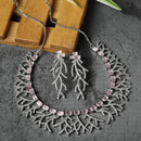 Rhodium-Plated Pink American Diamond Studded Eccentric Design Necklace & Earrings Jewellery Set