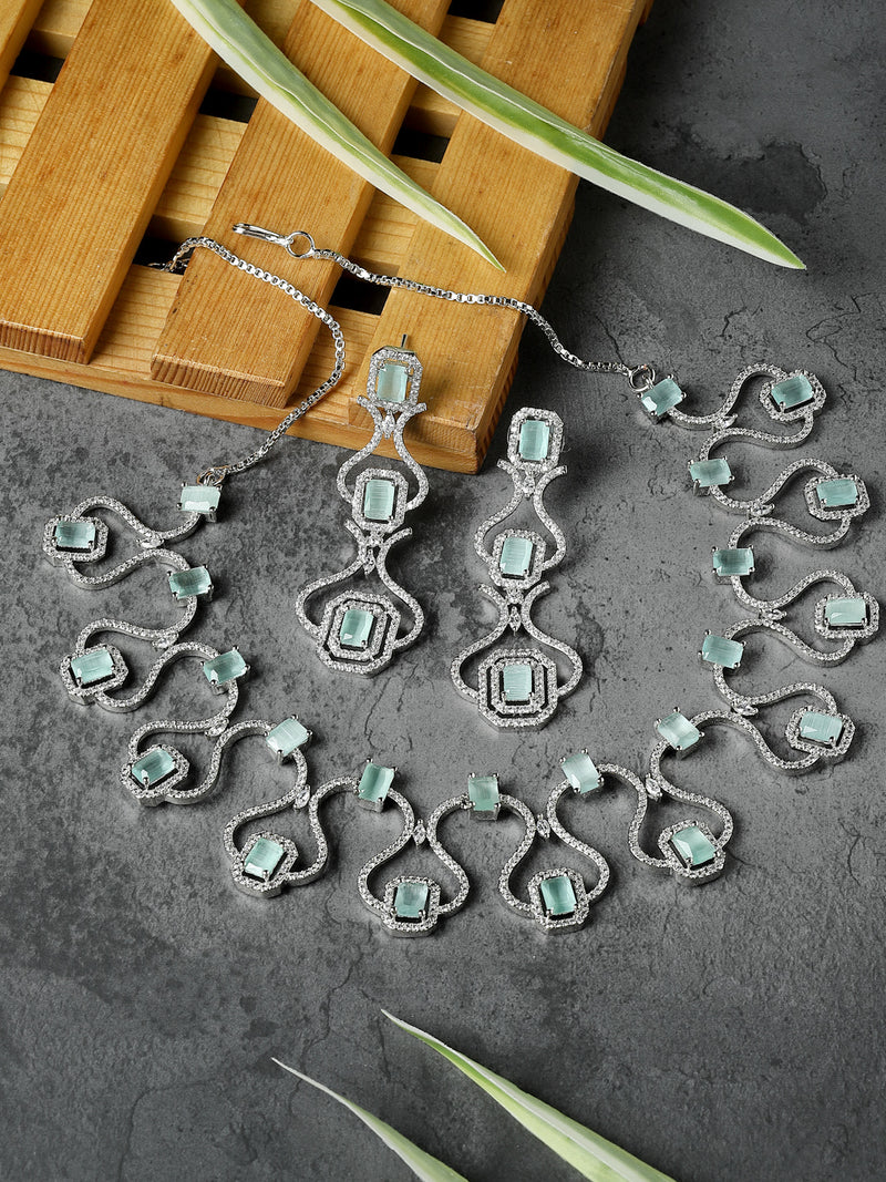 Rhodium-Plated Sea Green American Diamond Studded Outlandish Design Necklace & Earrings Jewellery Set