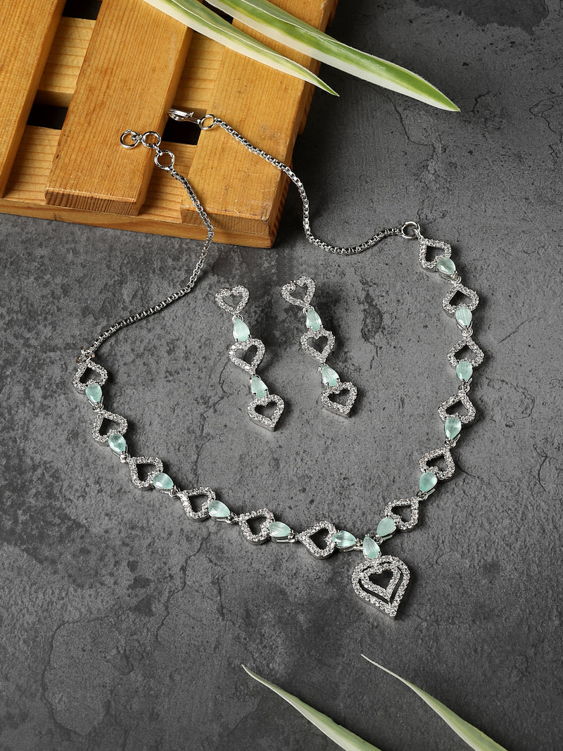 Rhodium-Plated Sea Green American Diamond Studded Heart Design Necklace & Earrings Jewellery Set