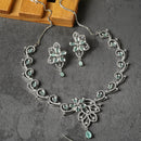 Rhodium-Plated Sea Green American Diamond Studded Floral & Paisley Shaped Necklace with Earrings Jewellery Set