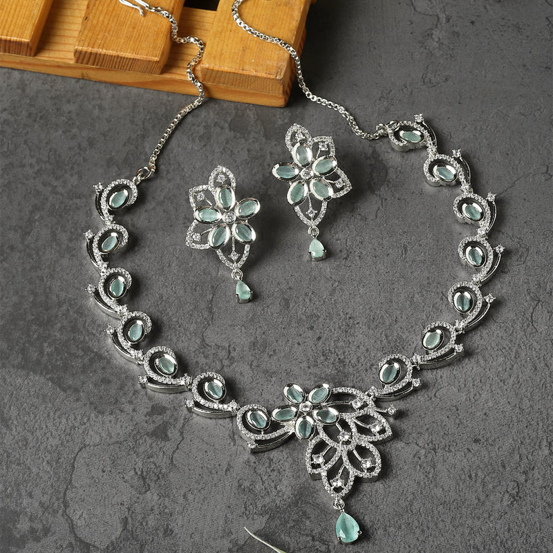 Rhodium-Plated Sea Green American Diamond Studded Floral & Paisley Shaped Necklace with Earrings Jewellery Set