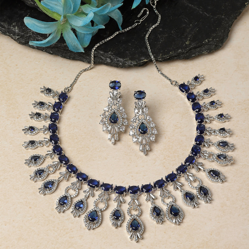 Rhodium-Plated Navy Blue American Diamond Studded Oval & Teardrop Shaped Necklace & Earrings Jewellery Set