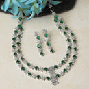 Rhodium-Plated Green American Diamond Studded Star Shaped Layered Necklace & Earrings Jewellery Set