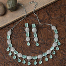 Rhodium-Plated Sea Green American Diamond Studded Intriguing Necklace & Earrings Jewellery Set