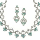 Rhodium-Plated Sea Green Oval American Diamond Studded Circular Shaped Necklace & Earrings Jewellery Set