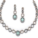 Rose Gold-Plated Gunmetal Toned Sea Green American Diamonds Studded Ovate Shaped Necklace & Earrings Jewellery Set