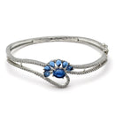 Rhodium Plated Silver Toned Flower Shaped Royal Blue American Diamond Studded  Bracelet