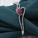 Rhodium Plated Silver Toned Flower Shaped Red American Diamond Studded  Bracelet