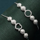 Rhodium Plated Silver Toned American Diamond Studded Heart & Halo Round Charm Adjustable Bracelet Combo Set of 2