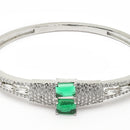 Rhodium Plated Silver Toned Square Shaped Emerald Green American Diamond Studded Bracelet