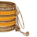 Gold-Plated Yellow Matte Finish Velvet AD Studded Gold Pearl Tasselled Bangles Set Of 56