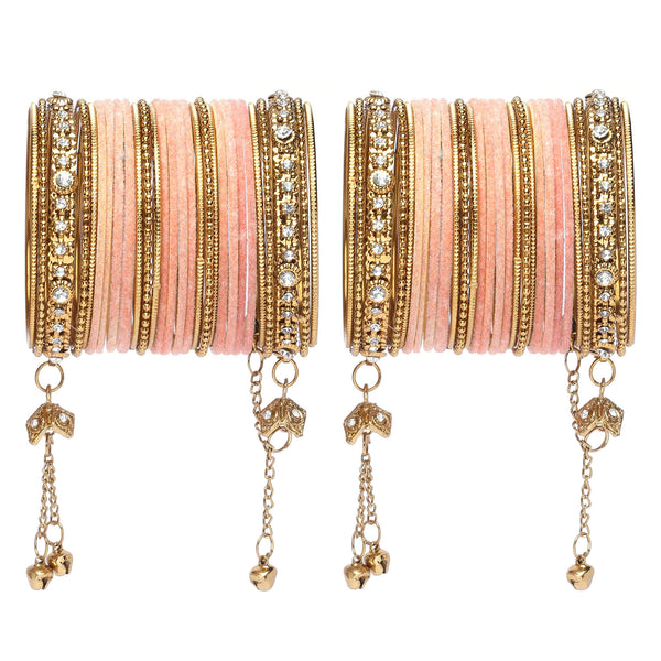 Gold-Plated Peach Matte Finish Velvet AD Studded Gold Pearl Tasselled Bangles Set Of 56