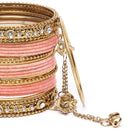 Gold-Plated Peach Matte Finish Velvet AD Studded Gold Pearl Tasselled Bangles Set Of 56