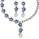 Rhodium-Plated Navy Blue American Diamond & White Pearl Studded Floral Necklace & Earrings Jewellery Set