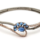 Rose Gold-Plated Black Toned Flower Shaped Royal Blue American Diamond Studded  Bracelet