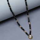Gold-Plated Black & White Artificial Stones Studded & Beads Beaded Round Shaped Locket Mangalsutra
