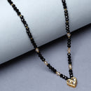 Gold-Plated Black & White Artificial Stones Studded & Beads Beaded Heart Shaped Locket Mangalsutra