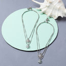 Rhodium Plated Silver Toned Flower Shaped Pink & Sea Green Cubic Zirconia Stone Studded Charm Anklets