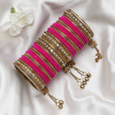 Gold-Plated Pink Matte Finish Velvet American Diamond Studded Gold Pearl Tasselled Bangles Set Of 56