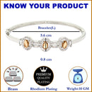 Rhodium-Plated Orange Oval Shape American Diamond Studded Kada Bracelet