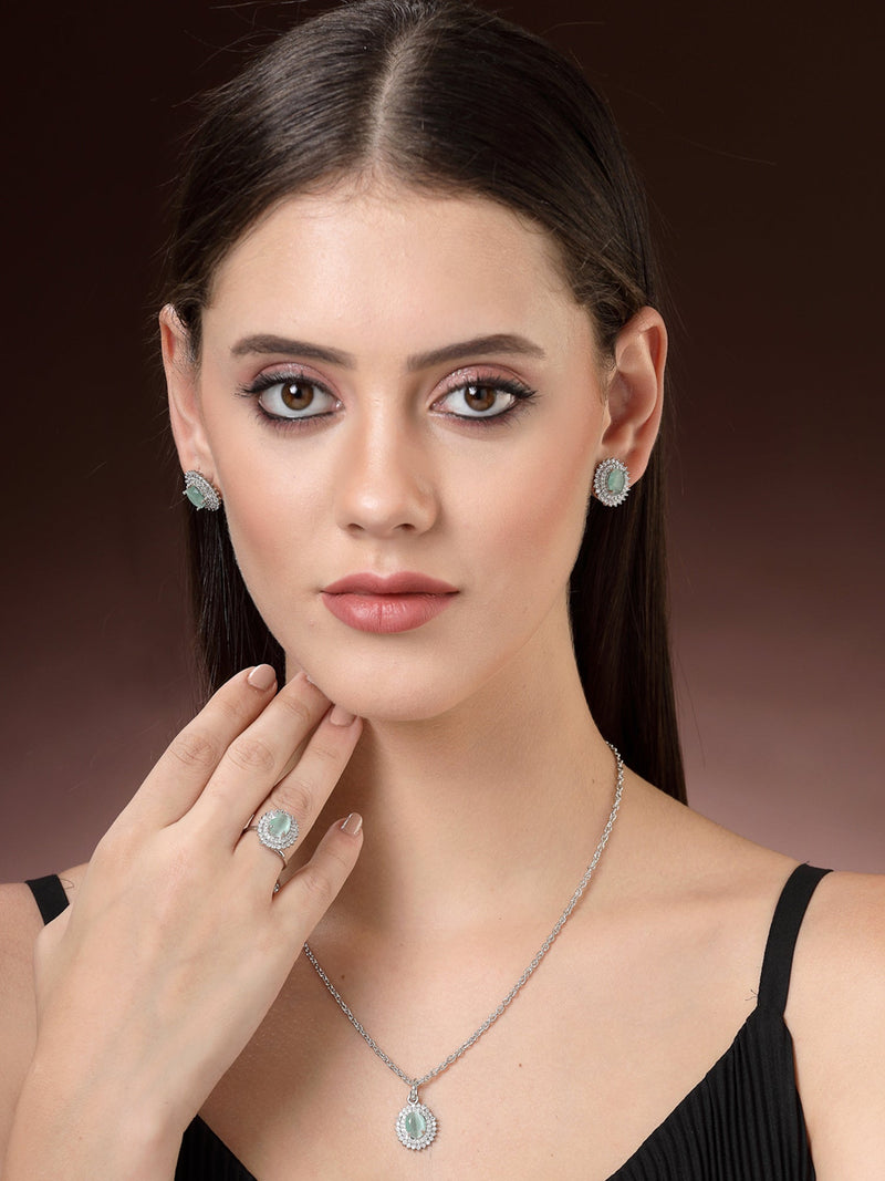 Rhodium Plated Silver Toned Oval Shaped Sea Blue American Diamond Studded Pendant Combo With Ring