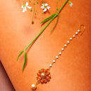 Gold-Plated Pearl Studded Orange Flower Maang Tikka