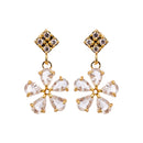 Floral Shaped Gold-Plated White American Diamond-Studded Necklace Set with Earrings