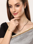ZENEME Gold-Plated & White AD-Studded & Beaded Oval Shaped Mangalsutra