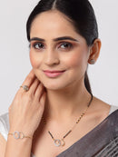 ZENEME Gold-Plated & White AD-Studded & Beaded Oval Shaped Mangalsutra